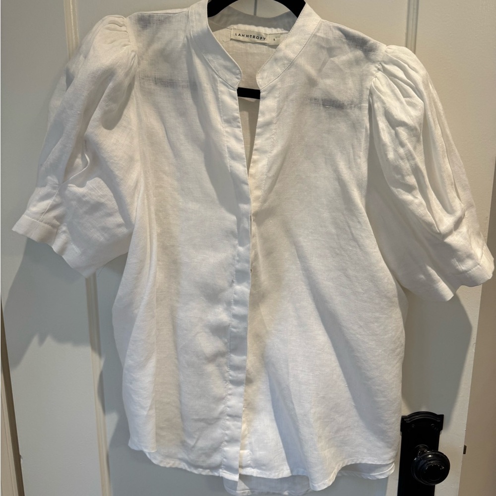 Lanthropy Puff Sleeve White Linen Blouse with hidden mother of pearl buttons.